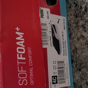 Brand new Puma black and white .. unisex